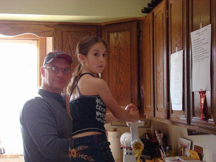 jim & kayleen butchering a pumpkin.....