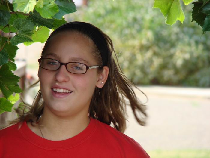 Megan under the grapes...